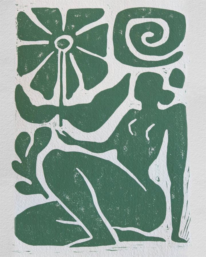Idea per un motivo: una donna con un fiore, in verde